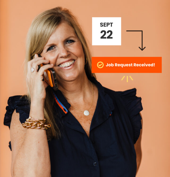 Mary Springer on the phone smiling, with a text overlay that says: September 22 - Job Request Received!